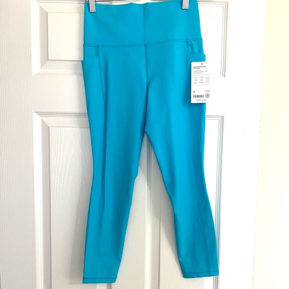 Athleta Salutation Stash 7/8 High Rise Leggings UPF+ Aqua Blue Small NWT - Picture 2 of 10